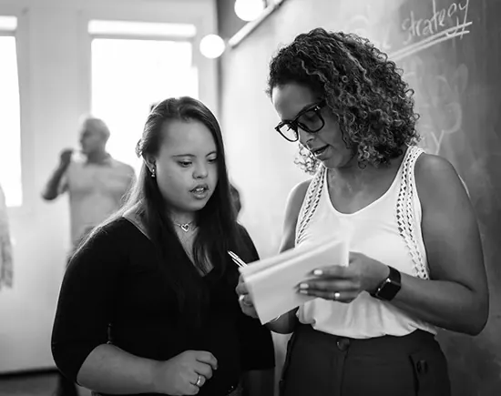 people looking at tablet